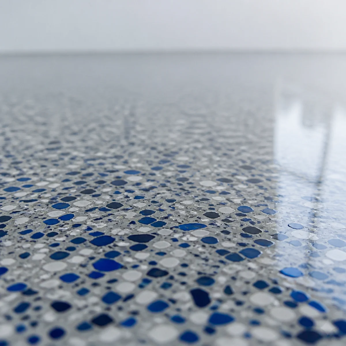 Clear topcoat over decorative flake epoxy
