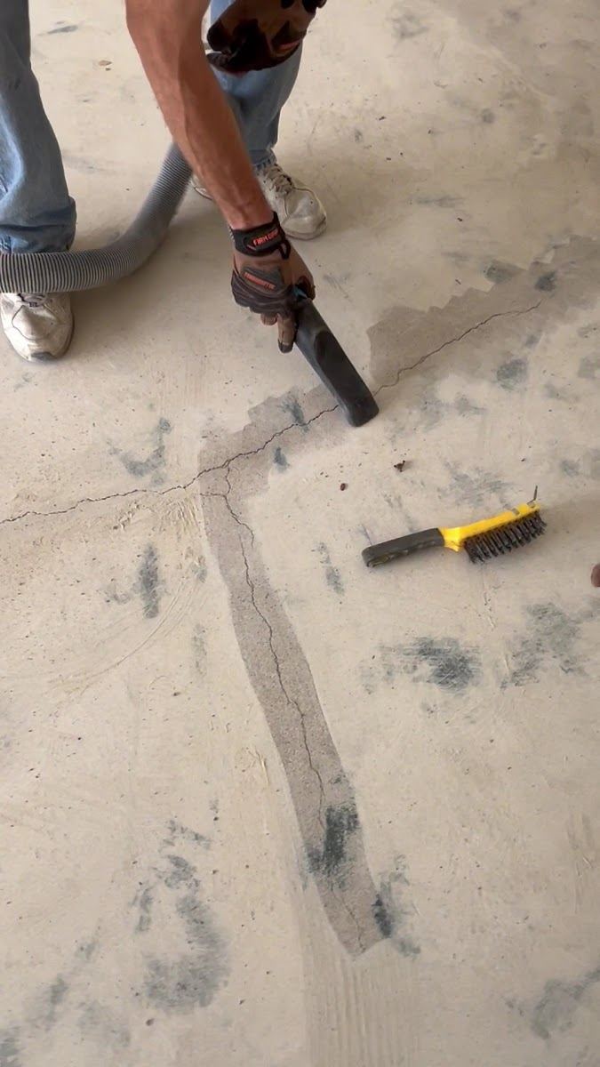 Concrete grinding in progress before epoxy
